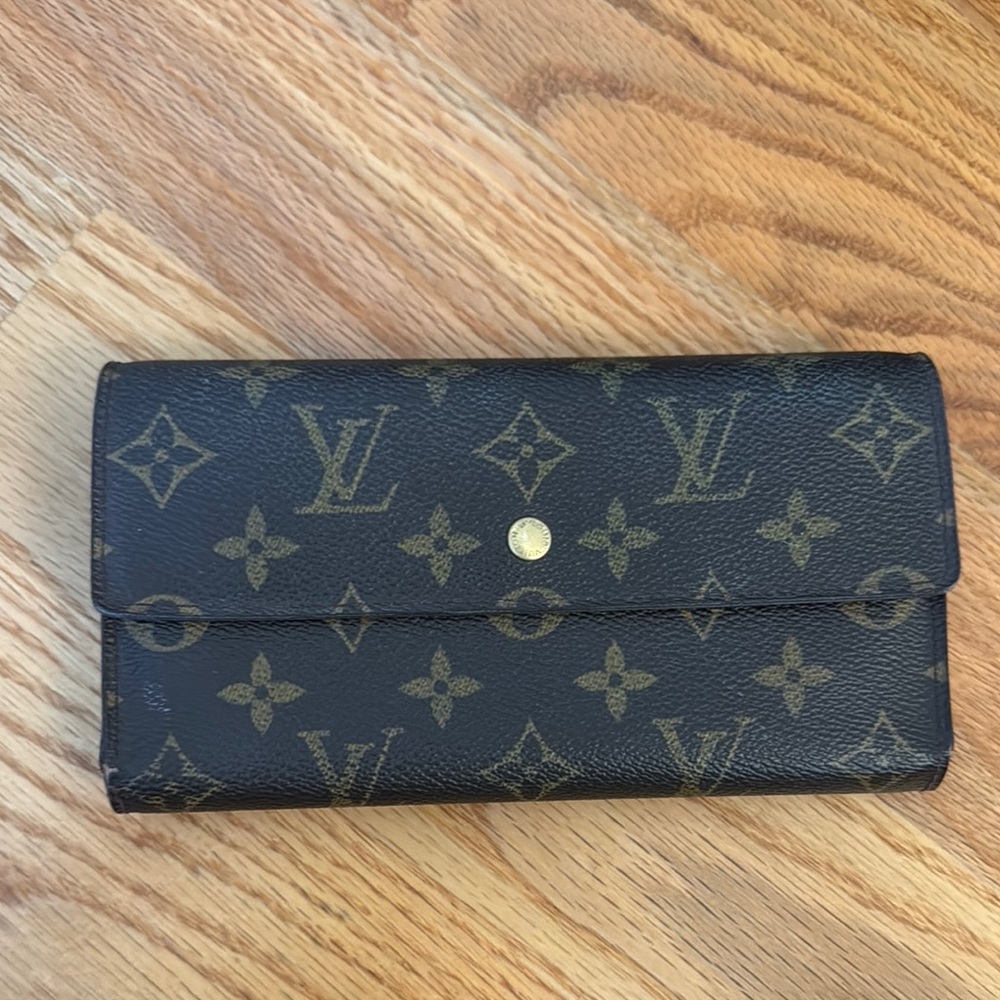 Dark Brown Louis Vuitton wallet with Monogram Design